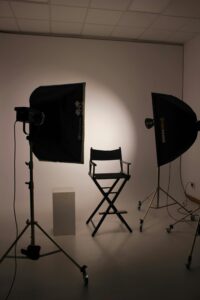 Empty studio with photography lighting and director chair in Wrocław.